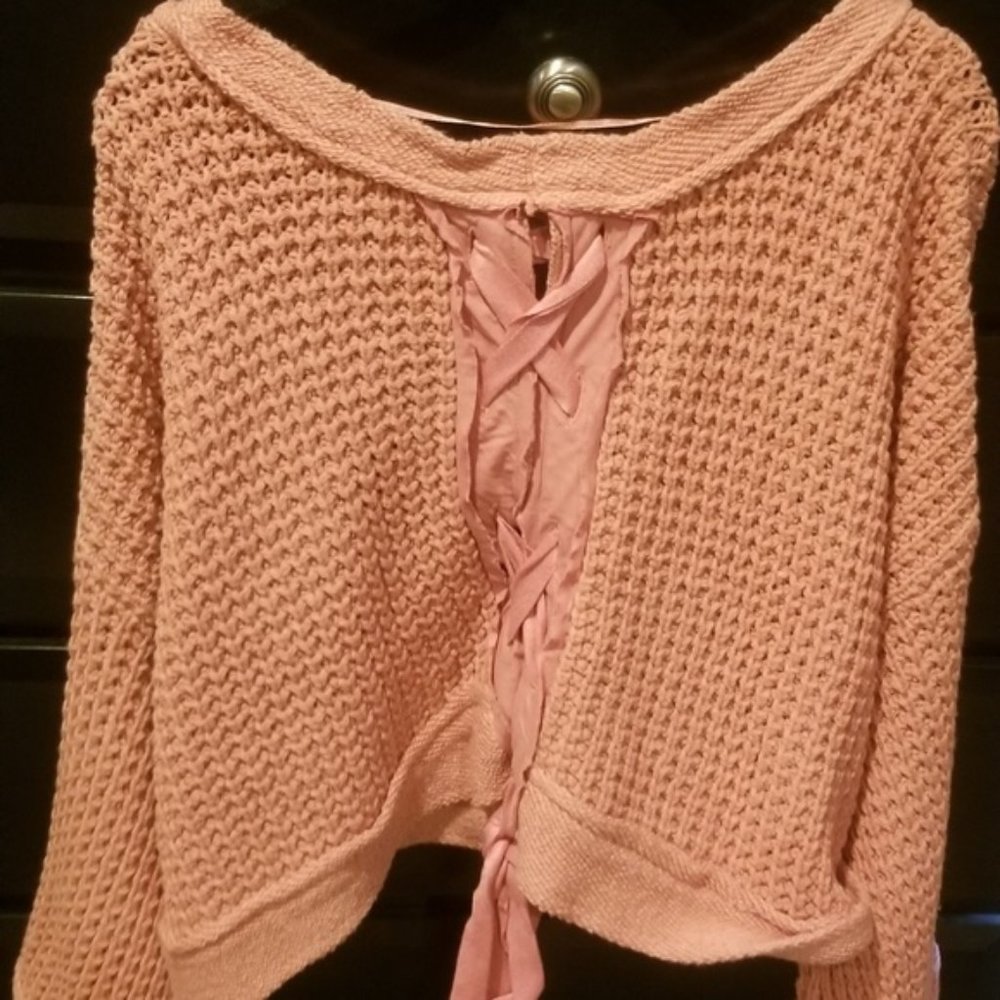 Free People lace up back sweater.